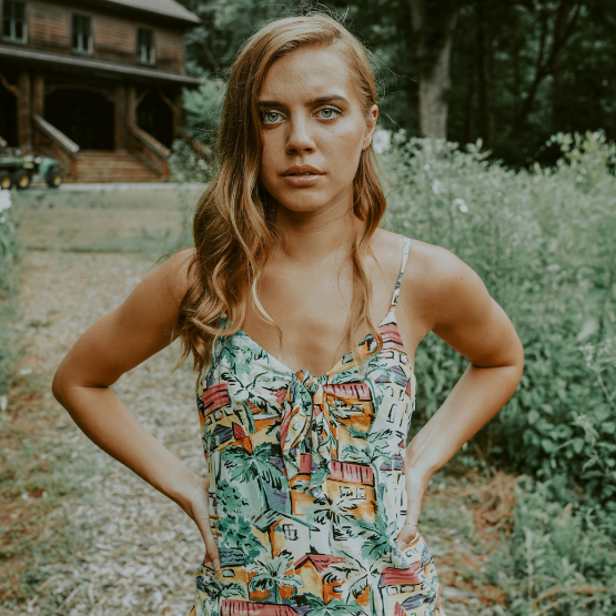 A girl standing in the forest